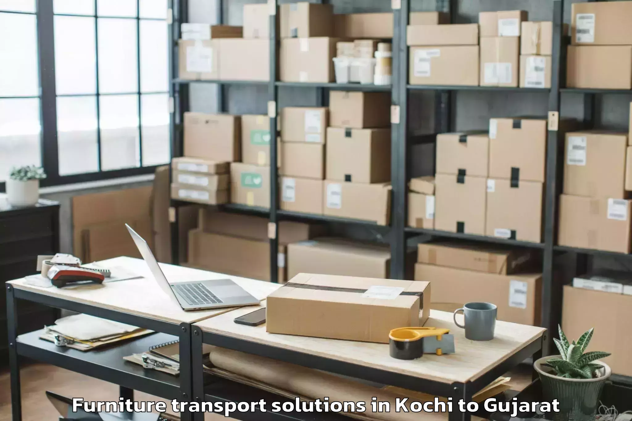 Easy Kochi to Ahmedabad Airport Amd Furniture Transport Solutions Booking